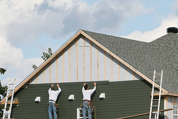 Professional Siding technician working in Hurdle Mills, NC